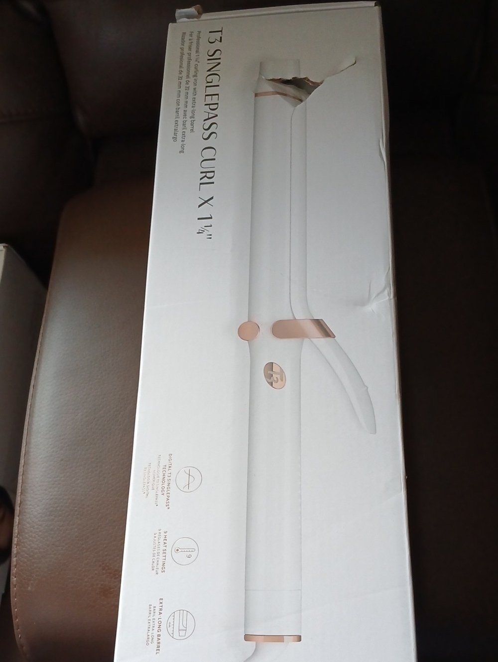 T3 White and Rose Gold 1¼" Curling Iron.       C